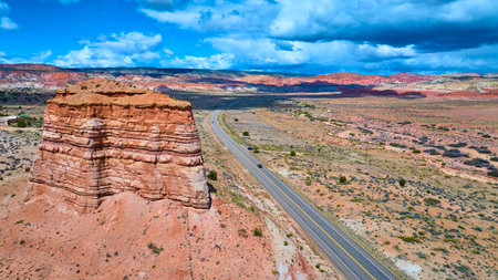 Aerial Southwest Desert Highway and Sandstone Mesa Adventure Canyon Point Utahの写真素材