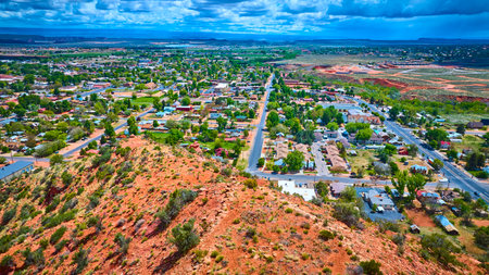 Aerial Small Town and Red Rock Desert Landscape Kanab Utahの写真素材