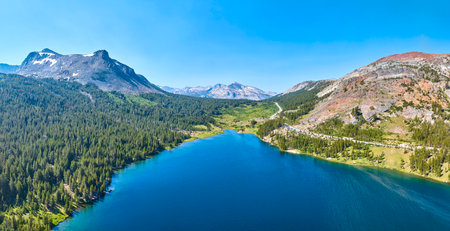 Aerial Tioga Lake Sierra Nevada Mountains Forest and Road Panoramaの写真素材