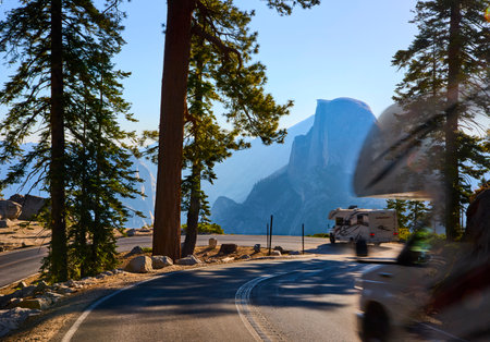 Yosemite Glacier Point Road RV and Half Dome Framed by Pine Treesの写真素材