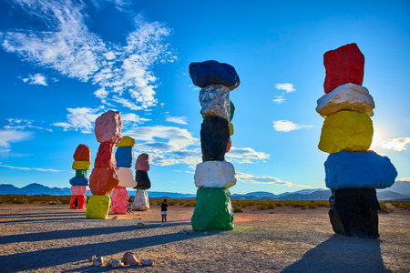 Seven Magic Mountains Colorful Rock Stack Cairns in Nevada Desert under Blue Skyの写真素材