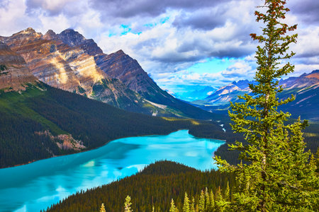 Peyto Lake Vibrant Blue Water and Majestic Mountain Landscape in Banff National Parkの写真素材