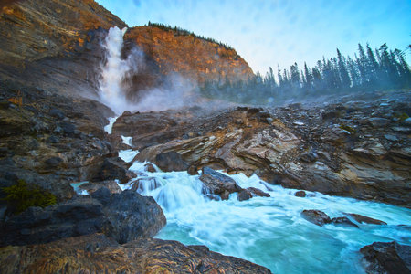 Takakkaw Falls Powerful Waterfall Flowing Over Rocky Mountain in Yoho National Parkの写真素材