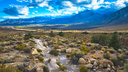 Aerial Wagon Trail Mountain Landscape and Valley in Eastern Sierra Californiaの写真素材