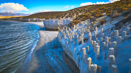 Aerial Crowley Lake Stone Columns Rugged Shoreline and Desert Landscape