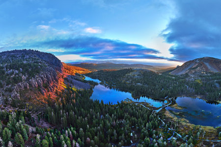 Aerial Panorama Sunrise Over Mountain Lake and Forest in California