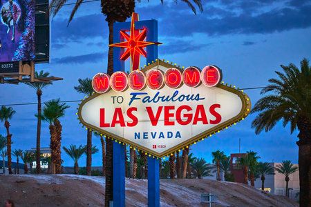 Welcome to Fabulous Las Vegas Sign and Palm Trees at Dusk in Nevadaの写真素材