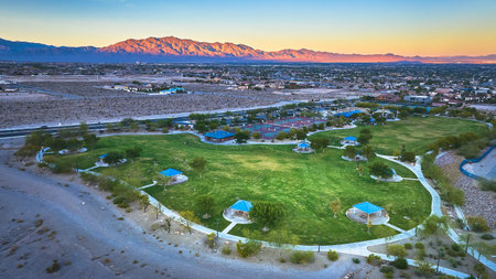 Aerial Lone Mountain Park Green Spaces and Blue Shelters in Las Vegas at Golden Hour