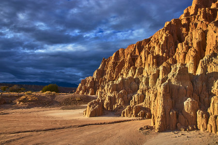Cathedral Gorge State Park Slot Canyon Formations Under Dramatic Desert Sky