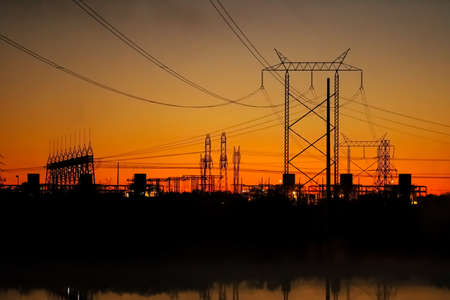 Electrical transmission lines at sunset, Lake Colorado City State Park, Morgan Creek Power Plant,...