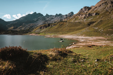 Spectacular lake in the Alps during autumnの写真素材