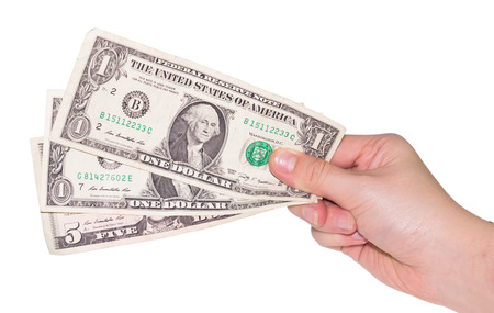 Hand with money isolated on white backgroundの写真素材
