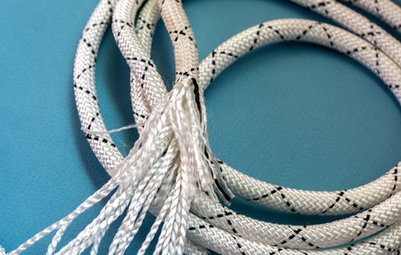 striped White rope on a blue backgroundの写真素材