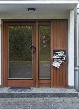 glass door with mailbox. door in the house.の写真素材