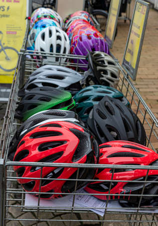 Denmark, Stubbekbing, 21.02.2019: sale of bicycle helmets of different colors. bicycle helmet in the...