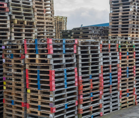 Sweden, Orebro, 24.02.2020: area with large stacks of euro palets ready for recyclingのeditorial素材