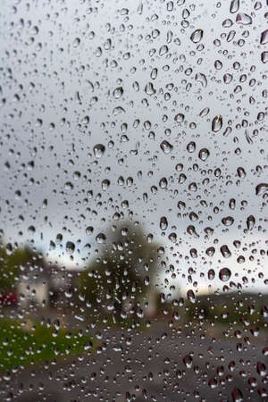 drops of water on the glass on a rainy day, glass with drops of waterの写真素材