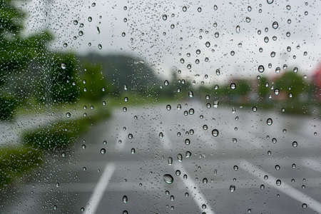 drops of water on the glass on a rainy day, glass with drops of water