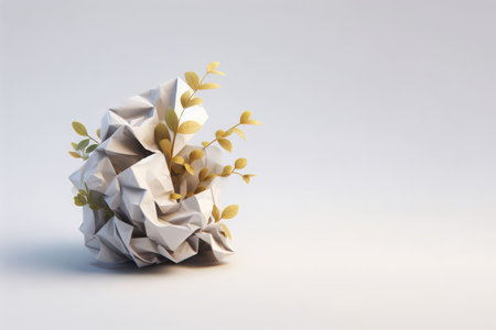 The plant breaks out of the lump of paper. Space for textの素材