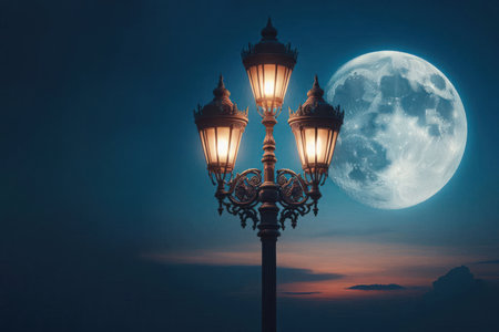 A single, antique lamppost against the background of the full moon. Space for textの素材