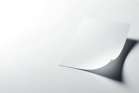 A single sheet of paper with a folded edge. Space for textの素材