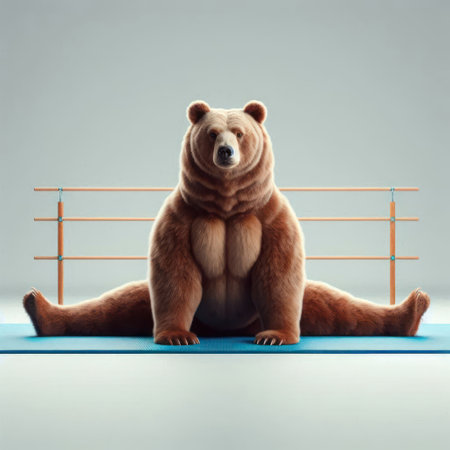 A bear doing splits on a training matの素材