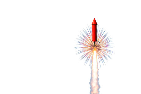 A festive rocket soars up with fireworks. Space for textの素材