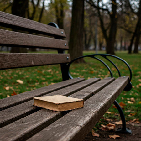 A book left on a wooden bench in the parkの素材