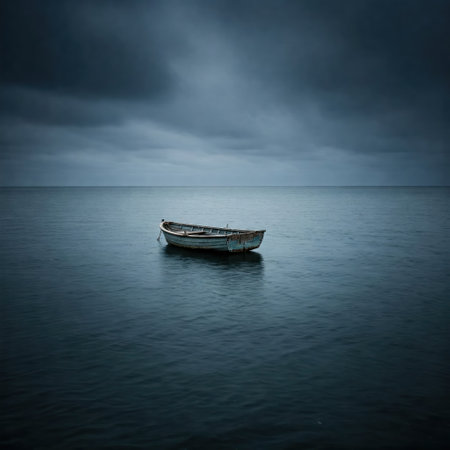 A lonely wooden boat on calm water under a gray skyの素材