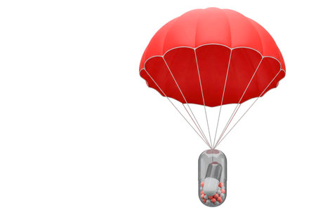 Capsule with medicines under the parachute. Space for textの素材