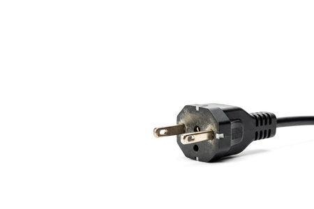 Electric plug with two pins on a white background. Space for textの素材