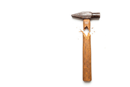 A broken wooden hammer on a white background. Space for textの素材