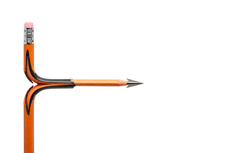 A pencil in the shape of an arrow with a curved trajectory. Space for textの素材