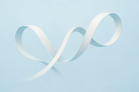 Intertwined ribbons on a blue backgroundの素材