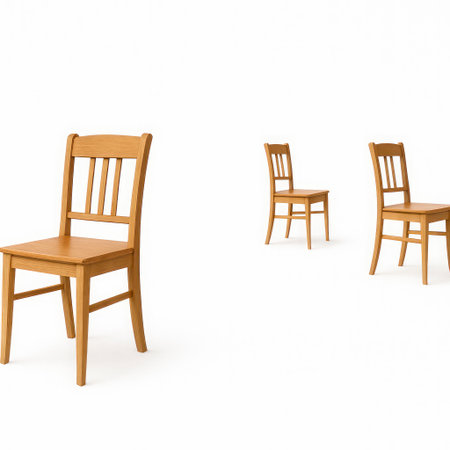 Three wooden chairs stand on a white backgroundの素材