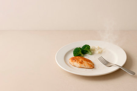 Homemade dinner with potatoes and vegetables on a light background. Space for textの素材