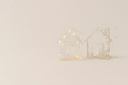 Fragile soap houses are on the verge of collapse. Space for textの素材