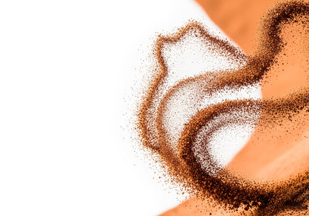 A whirlwind of brown sand in motion. Space for textの素材