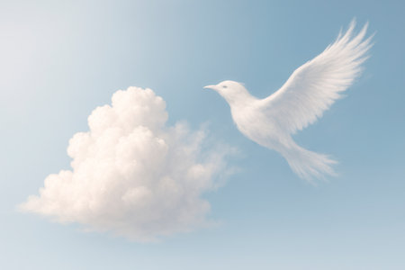 Bird-shaped cloud in blue sky. Space for textの素材