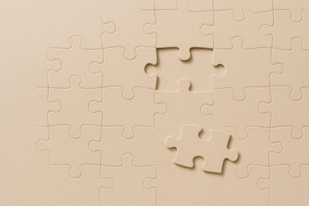 A puzzle with a missing piece. Space for textの素材