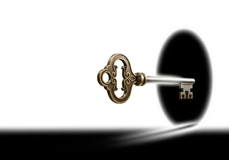 Vintage key in the keyhole of the black portal. Space for textの素材