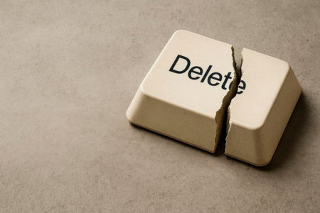The broken Delete key symbolizes the impossibility of deleting the past. Space for textの素材