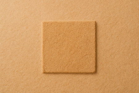 Square sand texture on a flat plain surfaceの素材