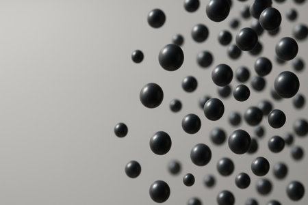 Black balls floating in space. Space for textの素材