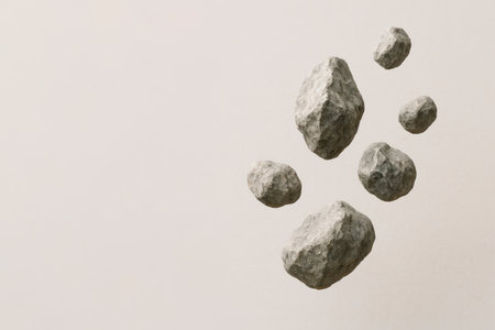 Stones floating in the air on a light background. Space for textの素材