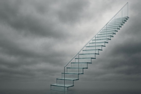 A glass staircase stretching into a cloudy sky. Space for textの素材