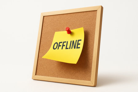 Cork board with an offline note on a bright stickerの素材