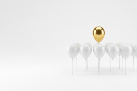 One golden ball among the white balls. Space for textの素材