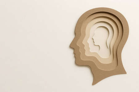 A multi-layered silhouette of a human head made of paper. Space for textの素材