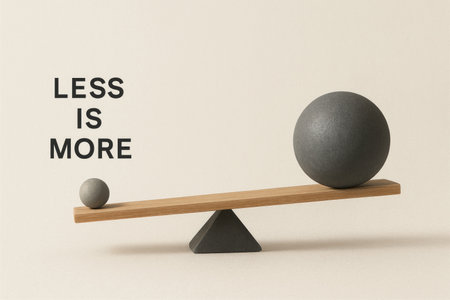 Big and small balls on a swing, the concept of less is more. Space for textの素材